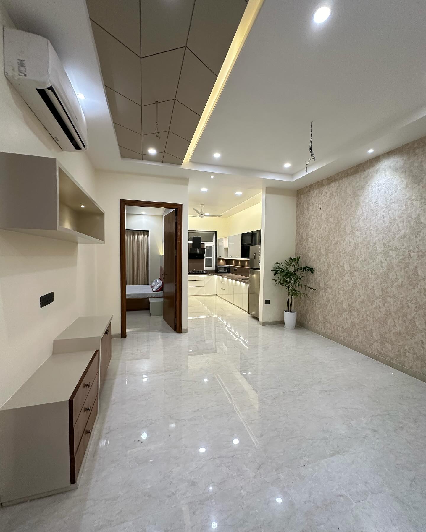 Low Budget Living Room Design with Spacious and Seamless Layout